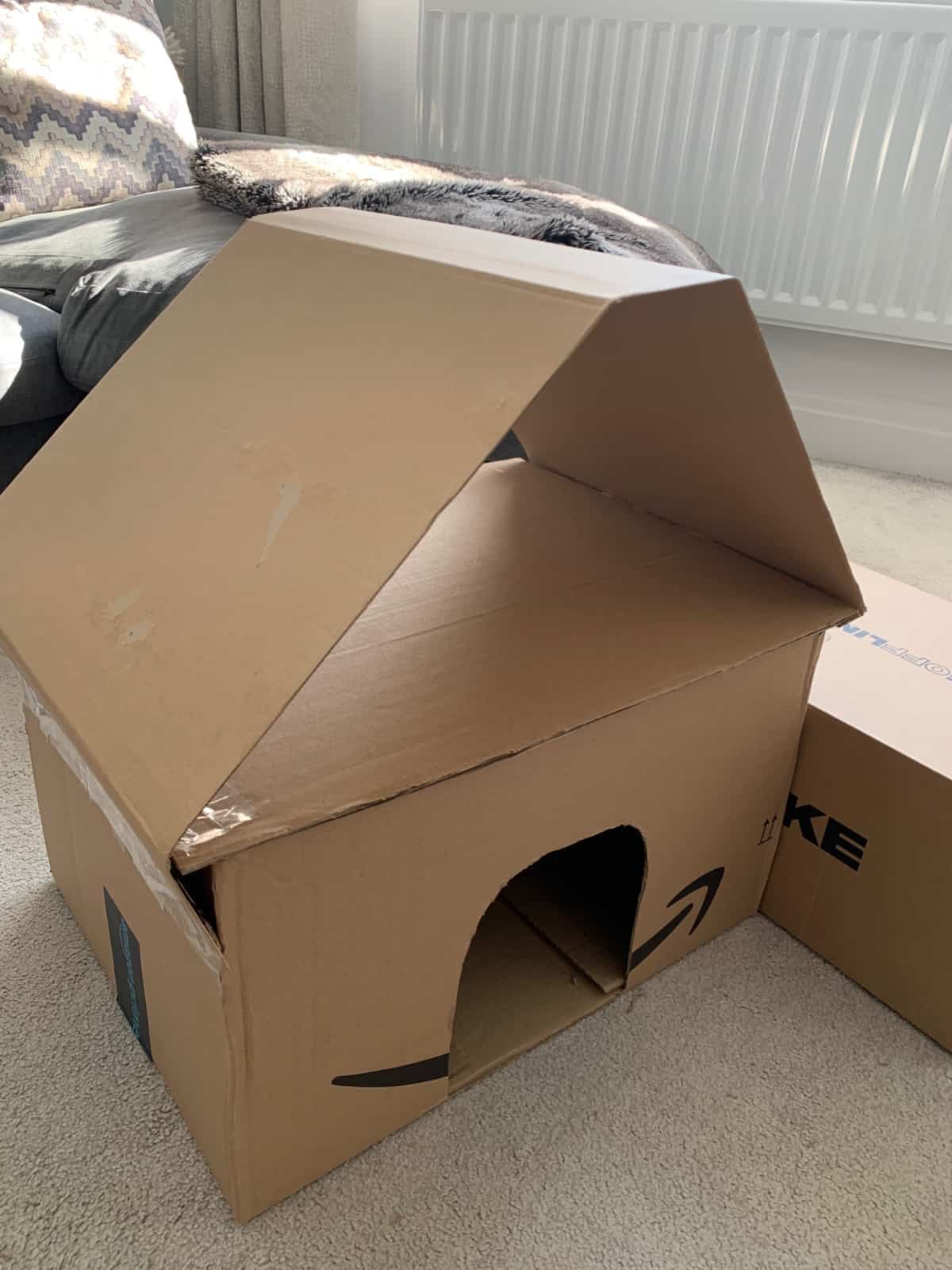 Cat house made of boxes hotsell